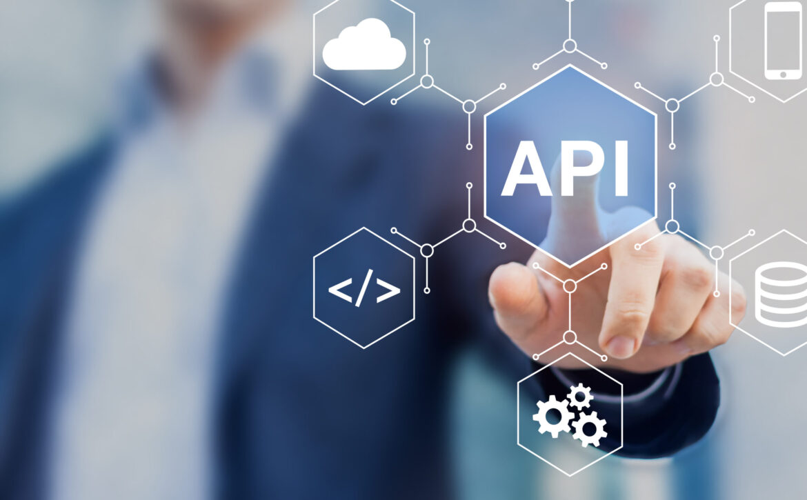 API Application Programming Interface connect services on internet and allow network data communication, software engineer touching concept for IoT, cloud computing, robotic process automation