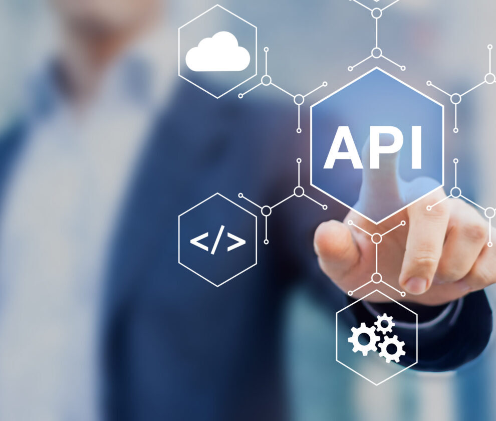 API Application Programming Interface connect services on internet and allow network data communication, software engineer touching concept for IoT, cloud computing, robotic process automation